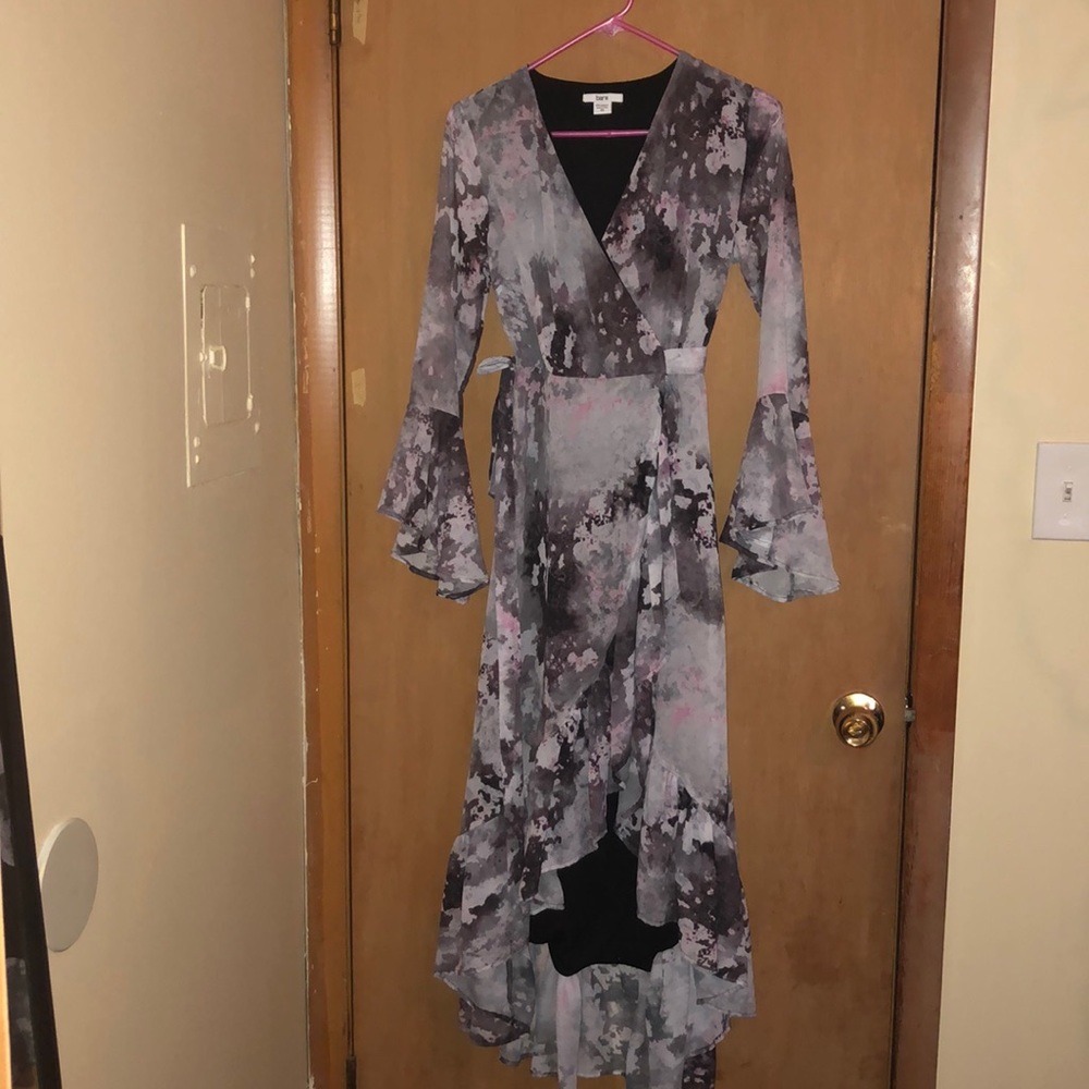 A multi colored flowing high low dress